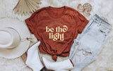 “be the light” Graphic T; S-2XL